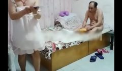 Chinese woman and her guy at the hotel