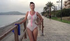 Wet transparent swimsuit in public