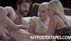 Eighteen-year-old adoptive candidate Elsa Jean is snuggled by her adoptive parents in a fiery threesome